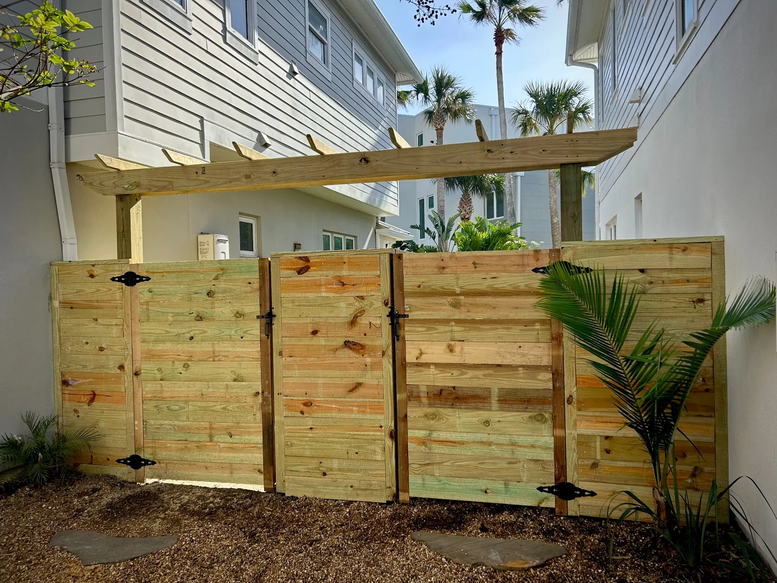 Custom wood fencing and gate by Cypress Building Group