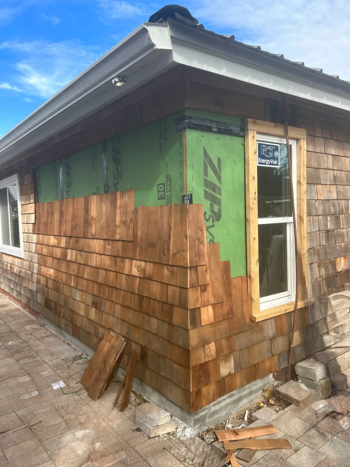 Cedar siding installation by Cypress Building Group